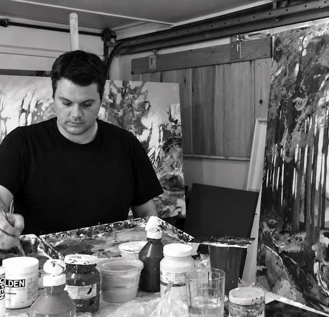 Shane Norrie working in his studio